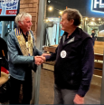 Trace gives Phil his Board pin